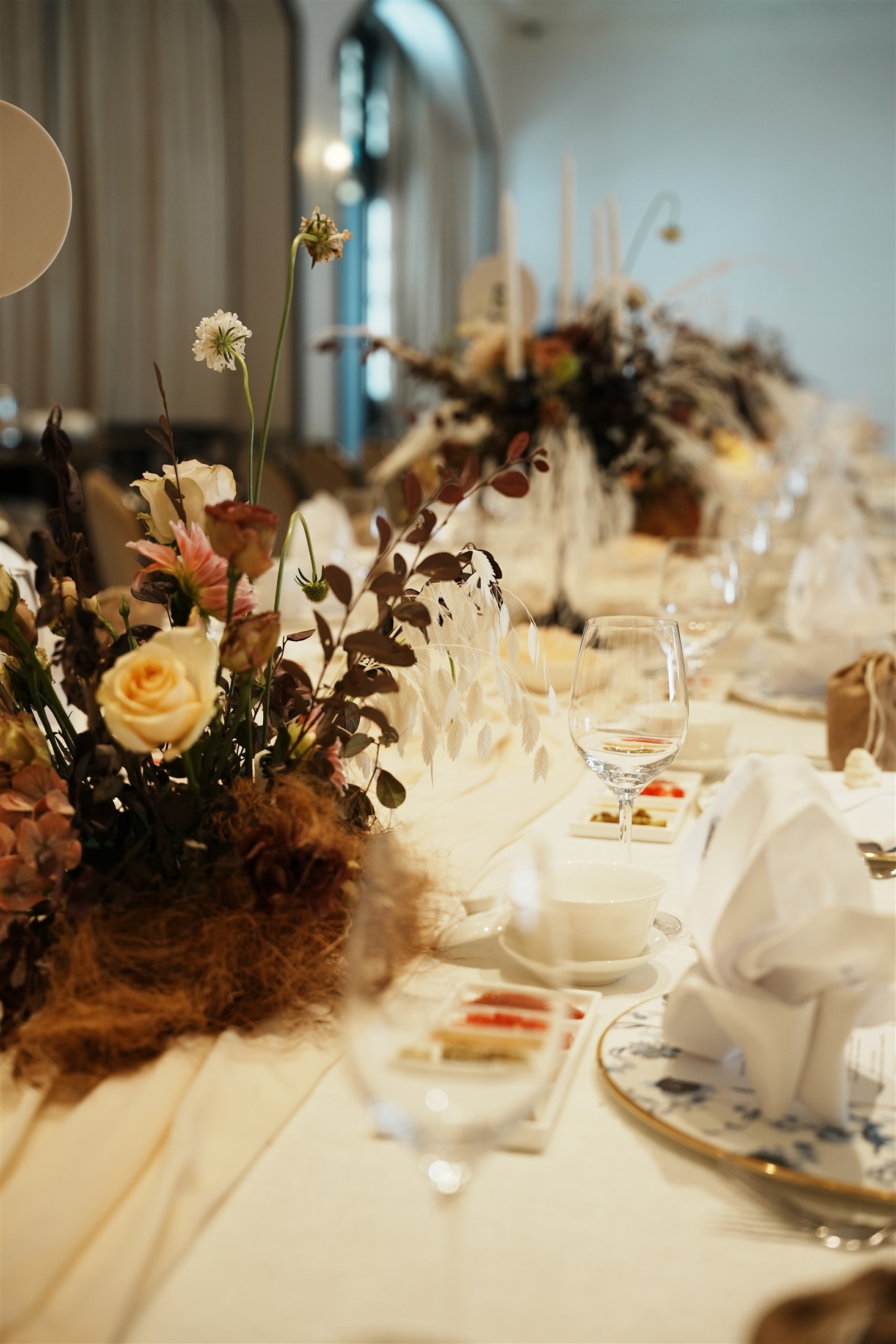 Expressive floral composition in cream and warm earthy tones