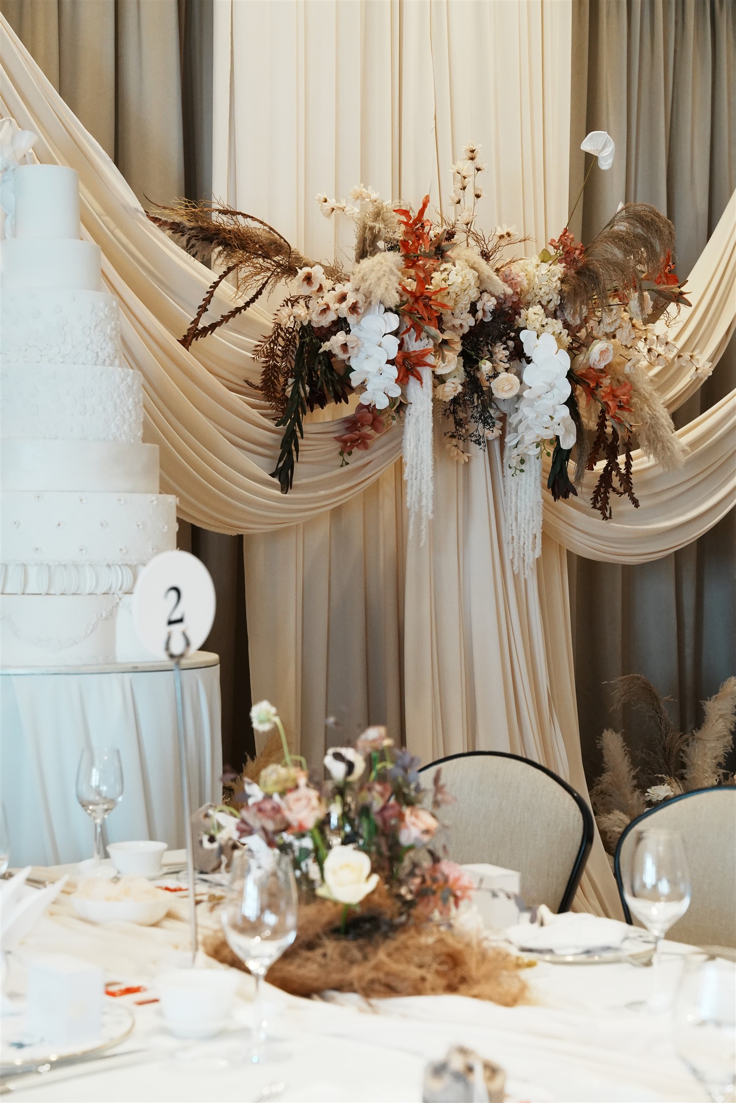 Sculptural drapery and floral installation